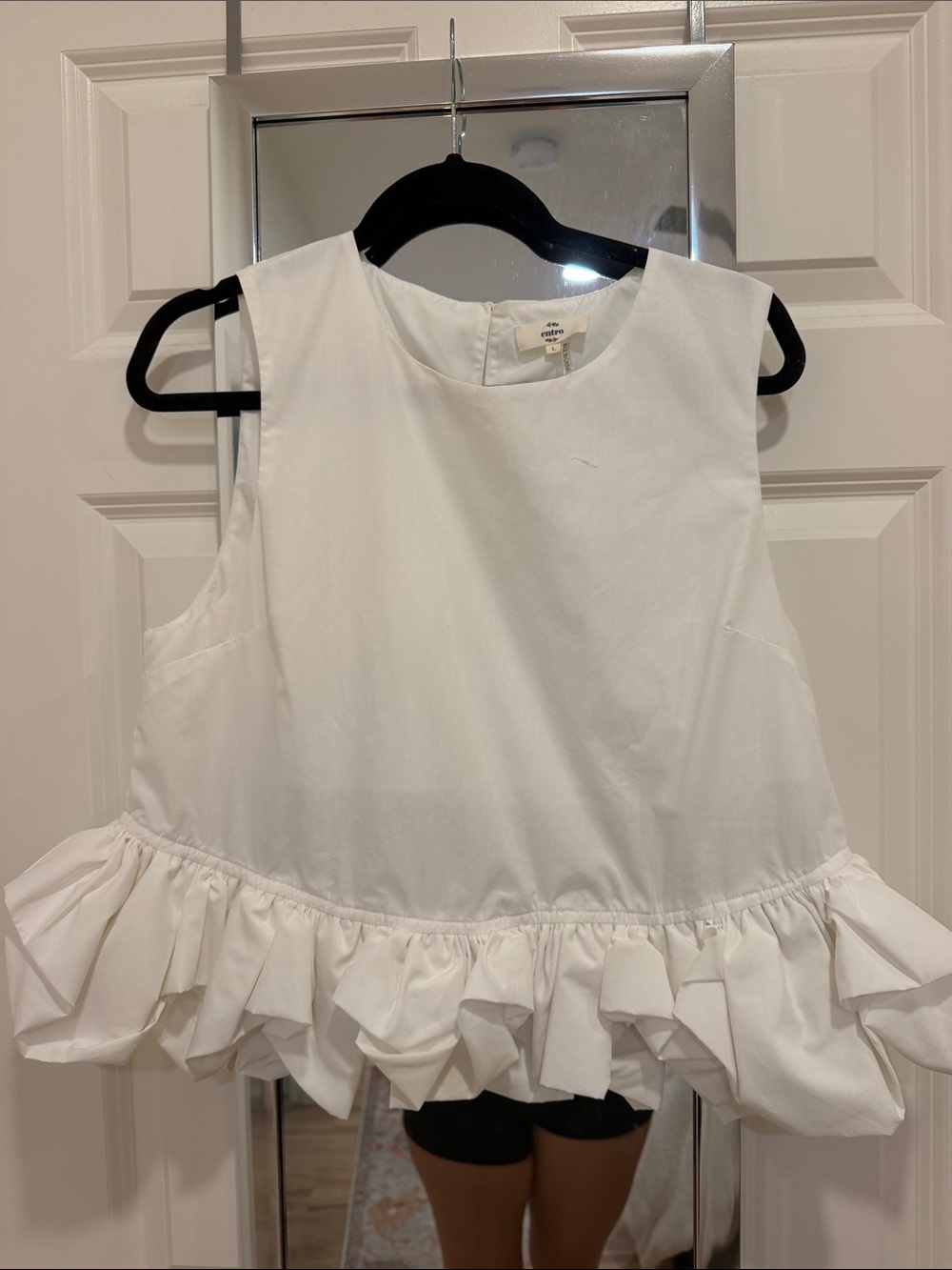 White Ruffle Hem Sleeveless Top
